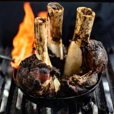 Open fire cooking of goat meat