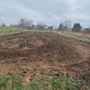 a plowed field that is going to receive treatment.